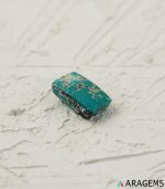 Perspective view of rectangular Iranian turquoise cabochon showing polished top and natural sides-T6-Aragems