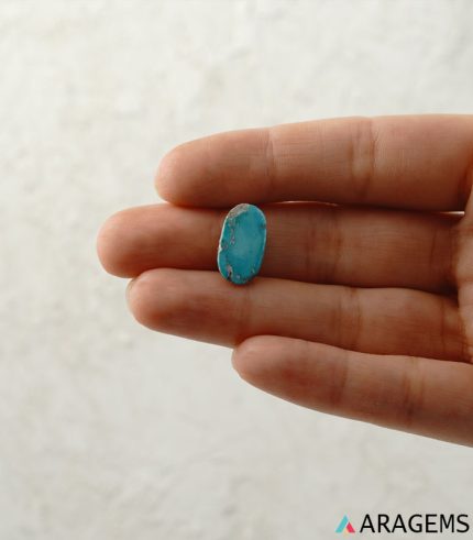Blue Persian turquoise cabochon shown on hand to display real-life size and natural texture-T7 | Aragems