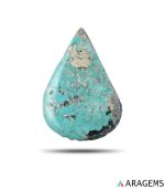 Persian turquoise cabochon showing sky-blue color with metallic pyrite matrix inclusions. T30