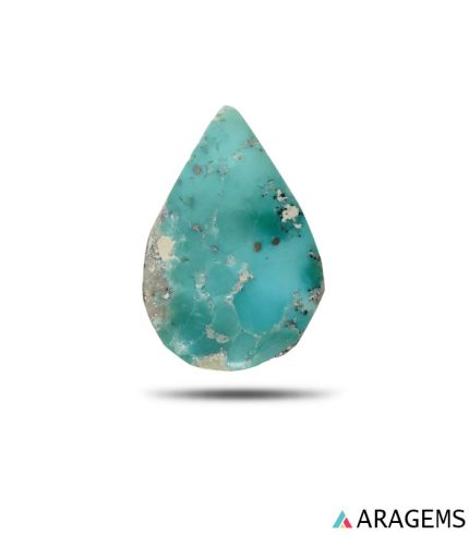 natural Iranian turquoise from Kerman mine showing blue-green color with scattered mineral matrix inclusions.T33