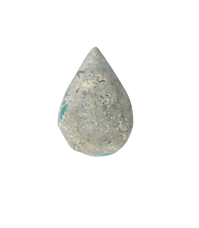 Back view of untreated Iranian turquoise displaying raw gray host rock texture with natural turquoise traces.T33