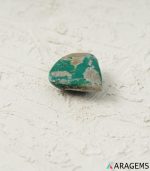 Natural green Kerman turquoise cabochon showing gray mineral matrix, alternate view - T38