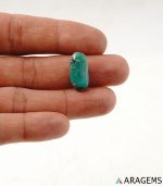 Natural green Kerman turquoise oval cabochon showing speckled white matrix, alternate view - T39